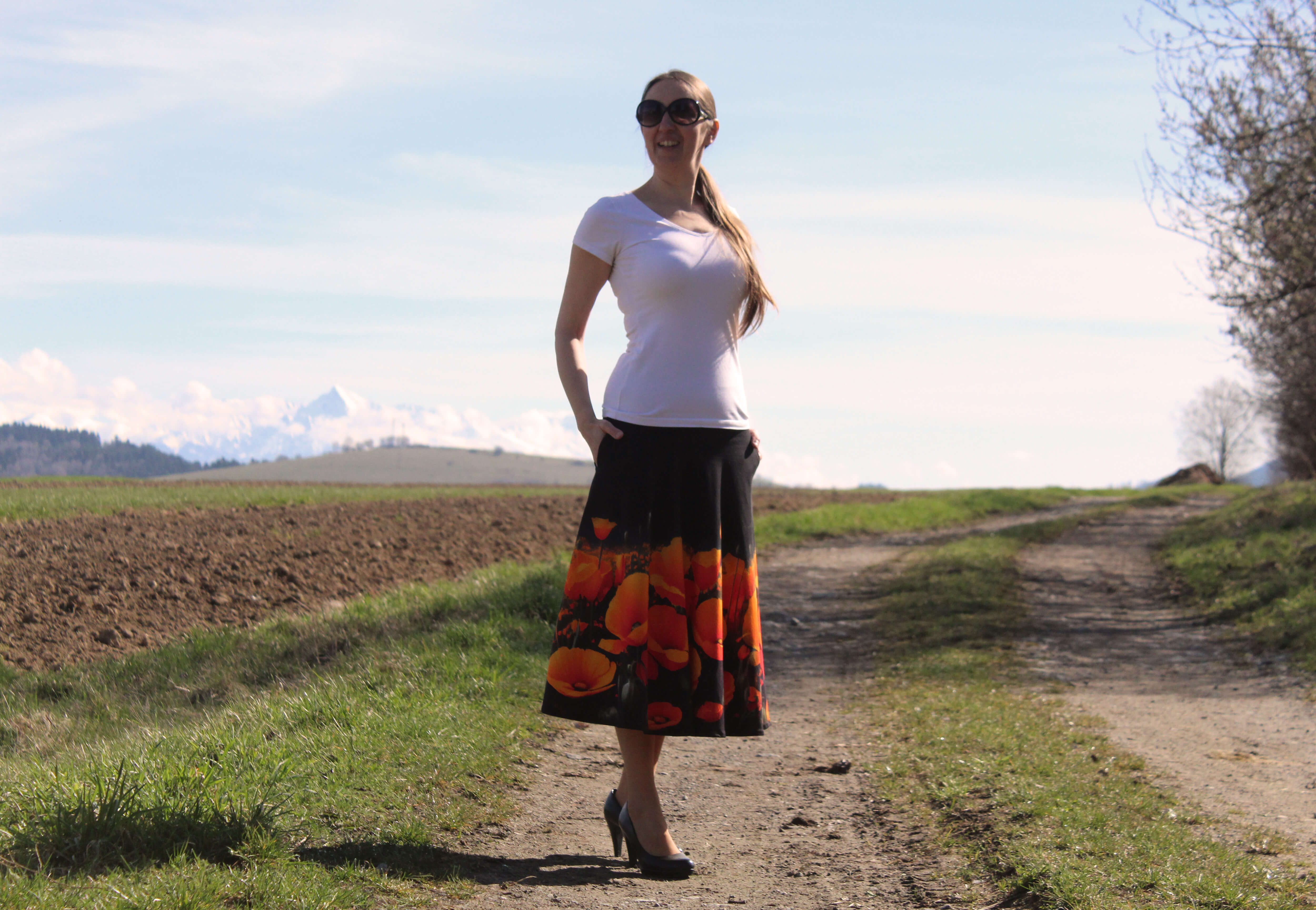 Úpletová sukňa oranžové maky