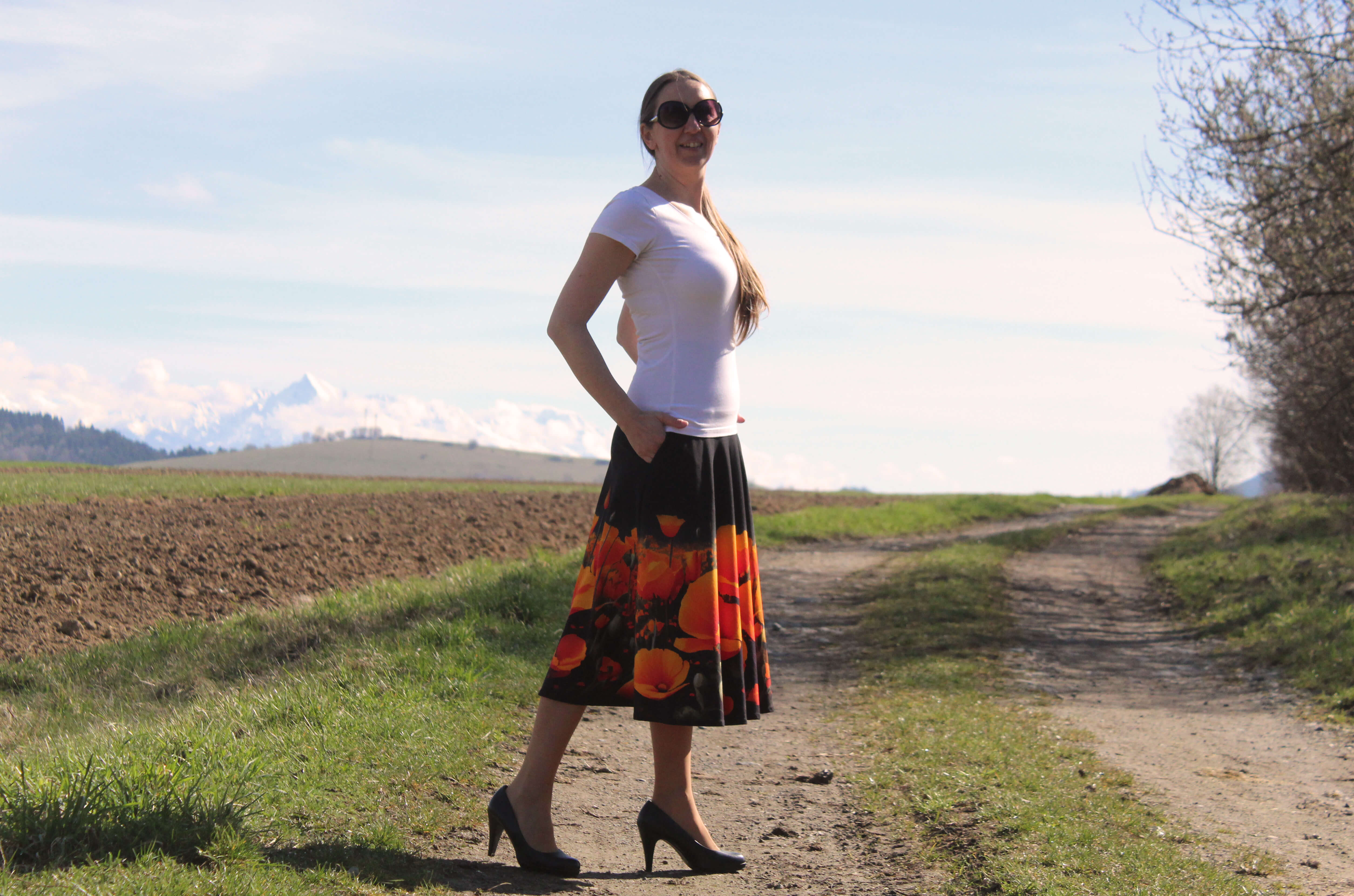 Úpletová sukňa oranžové maky